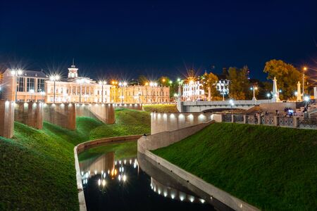 TOMSK, RUSSIA - September 25, 2019: Panoramic view night city with lanterns of embankment of Tom River in graniteのeditorial素材