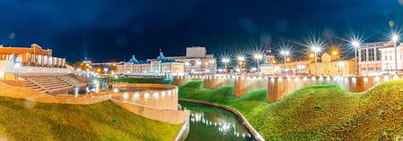 TOMSK, RUSSIA - September 25, 2019: Panoramic view night city with lanterns of embankment of Tom River in graniteのeditorial素材