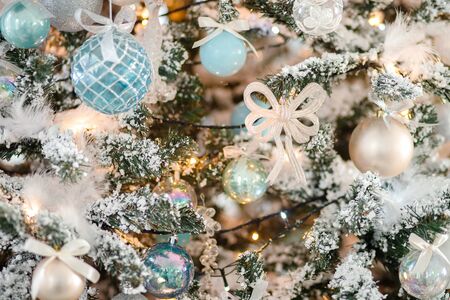 Closeup Christmas tree toy light backgroundの写真素材