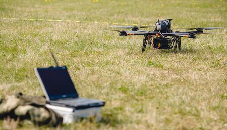 Military hybrid drone aerial test runs on hydrogen to detect people and put out firesの写真素材