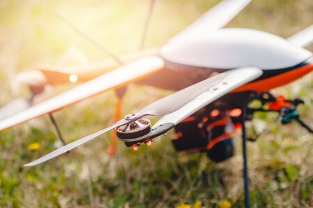 Military hybrid drone aerial test runs on hydrogen to detect people and put out fires.の写真素材