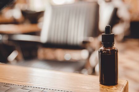 Oil care beard of man background barbershopの写真素材