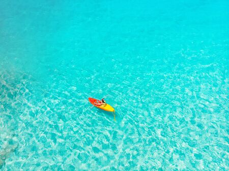 Aerial top view Kayak boat turquoise blue water sea. Concept travelの写真素材