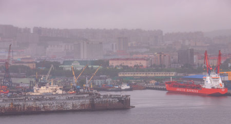 Murmansk, Russia - July 4, 2019: Panorama northern city. Cargo Port gulf of sea gray skyのeditorial素材