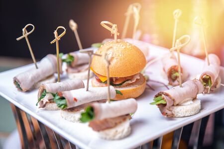 Catering service. Restaurant food canapes table with snack delicious diningの写真素材