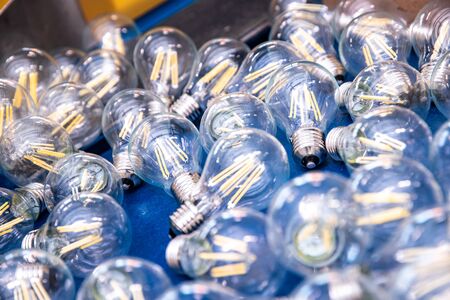 Automated workshop conveyor for production of glass lamps bulbs factory.の写真素材