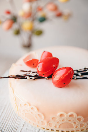 Closeup decoration for cake chocolate eggs and willow Easter