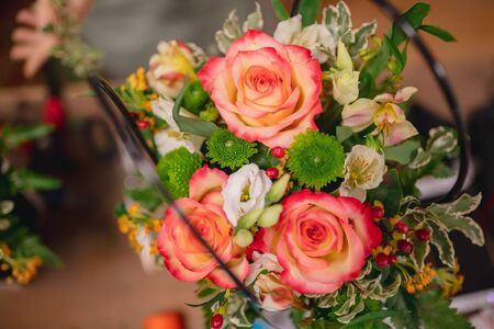 Flower bouquets pink roses in gift cardboard boxes in florist shop.の写真素材