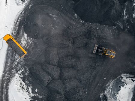 Open pit mine winter, extractive industry for coal, top view aerial droneの写真素材