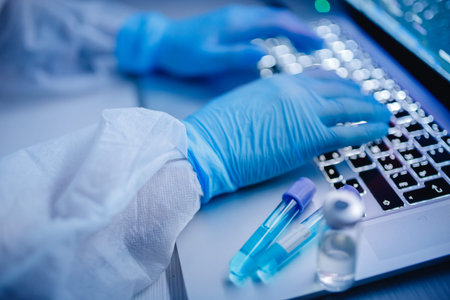 blood test, nurse in white hazmat protective epidemic.