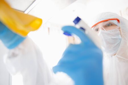 Cleaning and disinfection with antiseptics of viruses and germs, cleaner service against coronavirusの写真素材