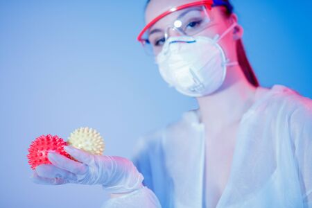 Blood test epidemic positive coronavirus medic in white hazmat protective. Chinese new Wuhan virus 2019-nCoVの写真素材