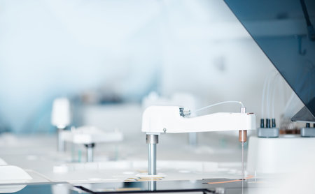 Automatic robot manipulator microbiologist analyzing test tube of blood samples for viruses. Concept vaccine search coronavirus 2019-nCoVの写真素材