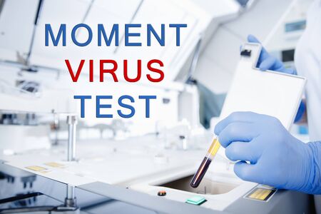 Instant express test of human blood for presence of virus. Epidemic coronavirus Prevention Concept.の写真素材