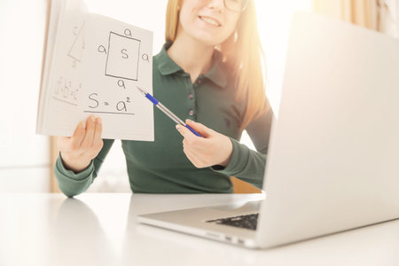 Online learning school, girl parses math classes with child