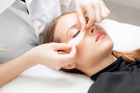 Spa anti-aging treatment, skin care patches in beauty salonの写真素材