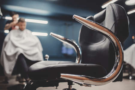 Blurred background Barbershop. hairdresser and hair salon, barber shop for menの写真素材