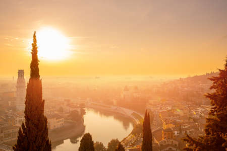 Beautiful aerial view panorama city bridge sunset Verona Italyの写真素材