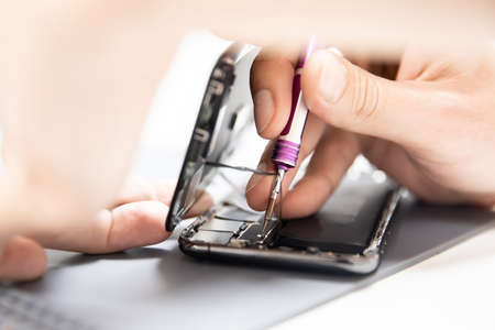 Mobile phone repair service, battery and screen replacementの写真素材