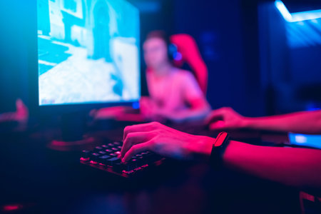 Professional gamer greeting and support team fists hands online game in neon color blur background....