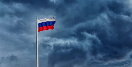 Russia flag waving on blue storm hurricane clouds sky background