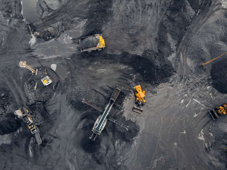 Coal mining an open pit extractive industry, top view aerialの写真素材