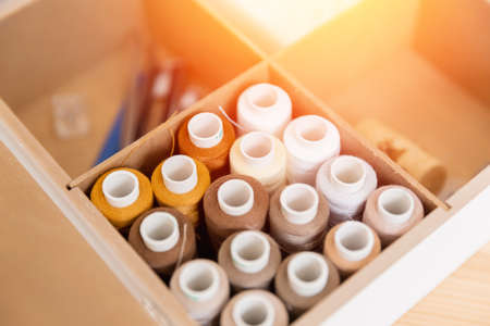 Colored threads in box for sewing machine tailorの写真素材