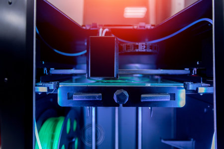 Modern 3D printer printing figure home close-up macro in innovation laboratory, black color