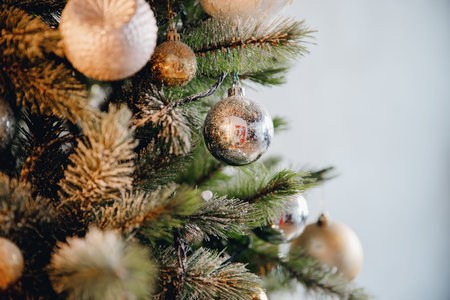 Natural background Scandinavian Christmas tree with New Year decorations balls