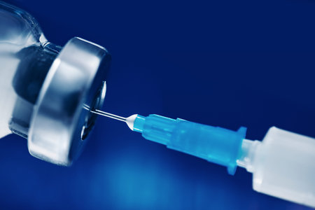 Vaccine vial dose coronavirus flu shot needle syringe. Concept impact of human medical vaccination...