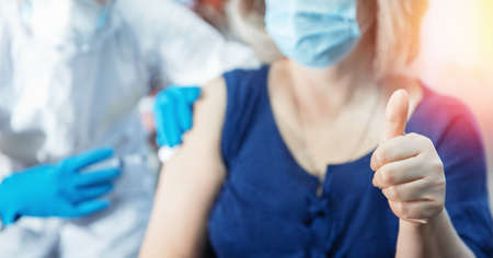 Concept Call for elderly to be vaccinated. Nurse vaccinates coronavirus Senior peopleの写真素材