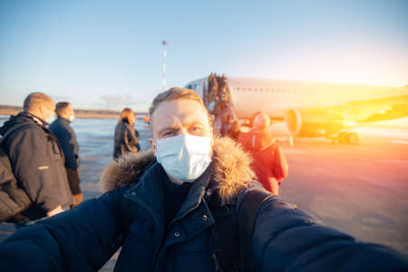Abstract Blur background of airplane airport against sun light waiting for passengersの写真素材