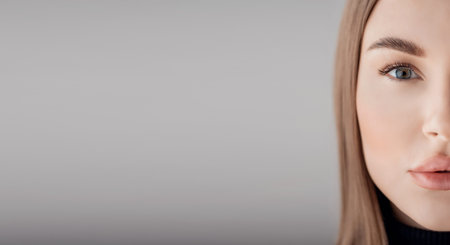 Portrait young Woman after Eyelash extension procedure microblading for green eyes in beauty salon
