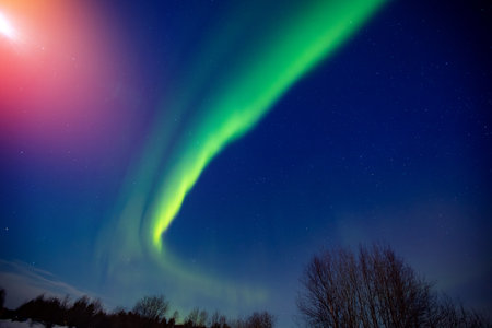 Arctic polar night starry sky background of aurora borealis and Northern Lightsの写真素材