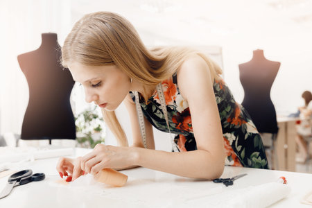 Photo modern woman designer seamstress work with lace, creating new clothes or underwear. Small...