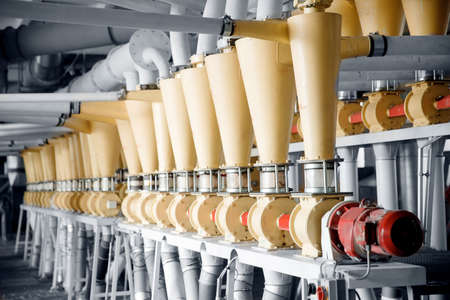Modern electrical mill machinery for production of wheat flour. Equipment Factory Grainの写真素材