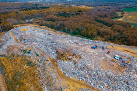 Concept environmental struggle with plastic pollution. Waste garbage dump household pile trash, aerial top view landfill backgroundの写真素材