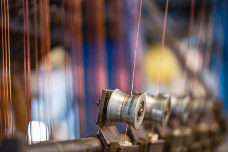Copper wire cable production in coils, metal steel industrial plantの写真素材