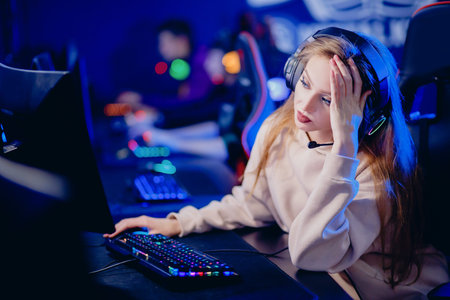 Facepalm streamer caucasian woman fail losing play gamer playing online video games computer emotions aggression, neon colorの写真素材