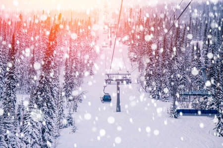Cold landscape sunset mountain ski lift resort in winter forest, aerial top view Kemerovo region Russiaの写真素材