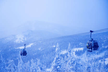 Landscape blue cold on mountain Sheregesh ski lift resort in winter, aerial top view Kemerovo region Russiaの写真素材