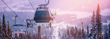 Banner Landscape mountain ski lift resort in winter forest sunset, aerial top view Kemerovo region Russiaの写真素材