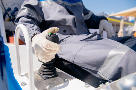 Miner engineer prepares to descend into ground on rail locomotive to miningの写真素材
