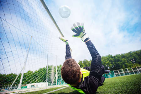 Goalkeeper soccer man didnt catch ball after penaltyの写真素材
