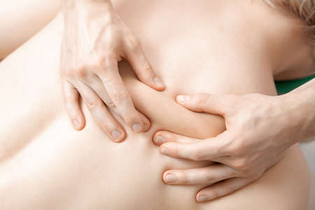 Anti cellulite back massage for slimming and removing subcutaneous fat, top viewの写真素材