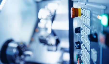 Red button Control panel CNC Industrial drill robot for detail machine factoryの写真素材