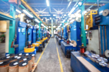 Blurred background industrial metal fabrication plant, engineering workshopの写真素材