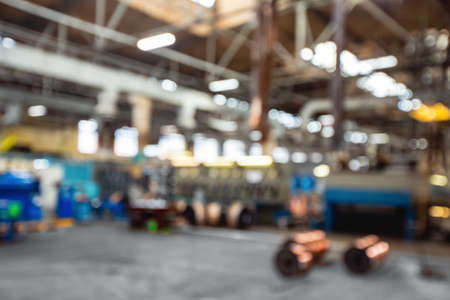 Blurred background industrial metal fabrication plant, engineering workshopの写真素材