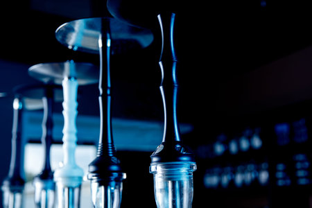 Hookah or shisha bar, dark black smoke background