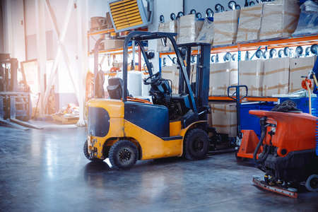 Logistics concept, industrial forklift in warehouse loader storeの写真素材
